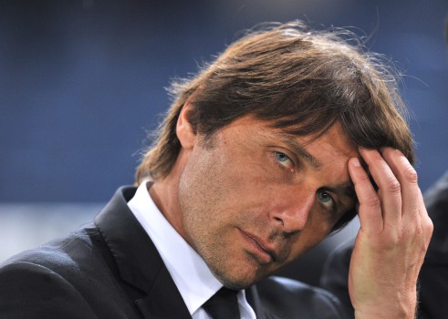 Juventus' coach Antonio Conte reacts aft